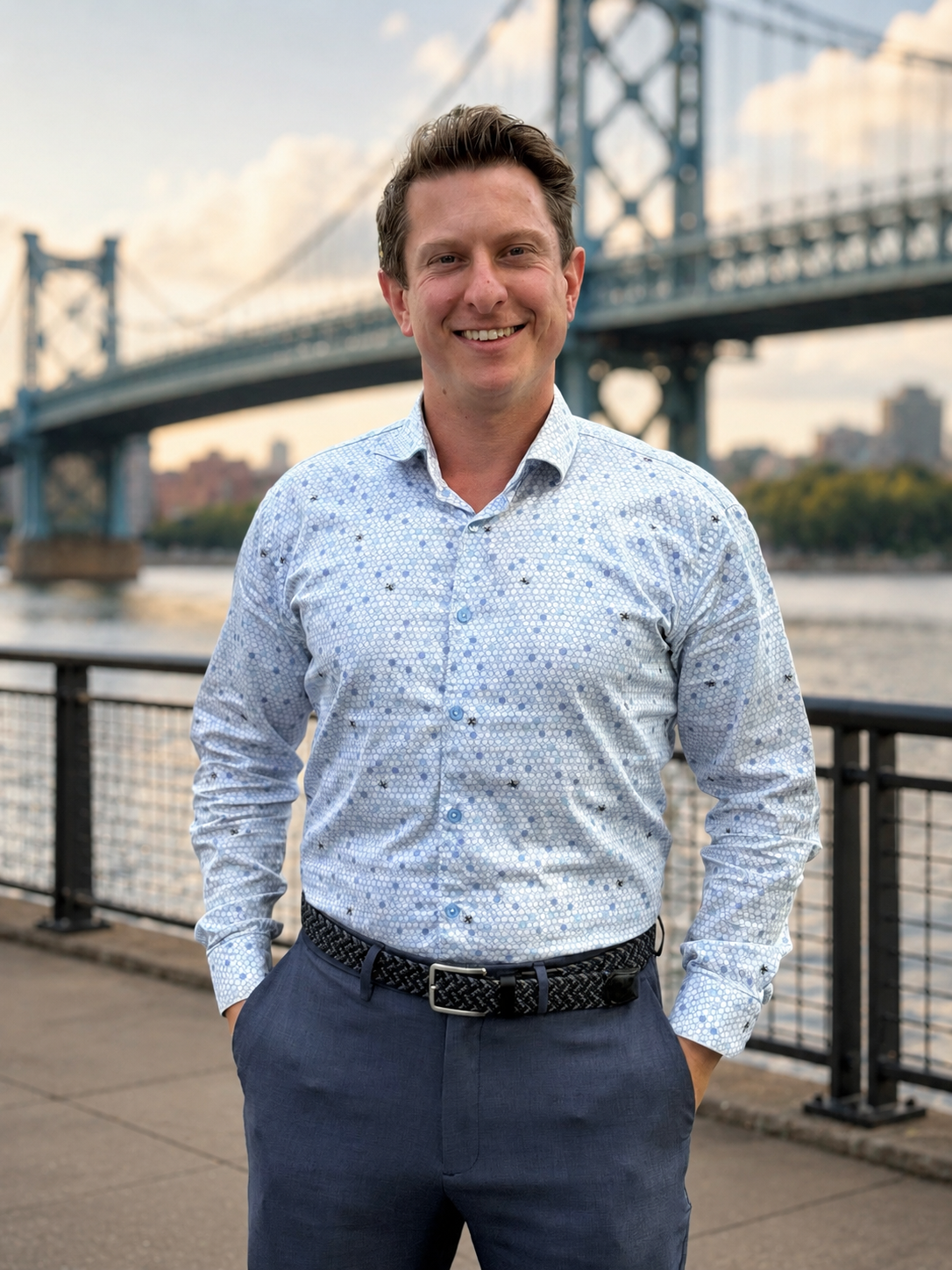 Marc Gabris, Founder of Bridge Builder Studios, standing in front of a bridge